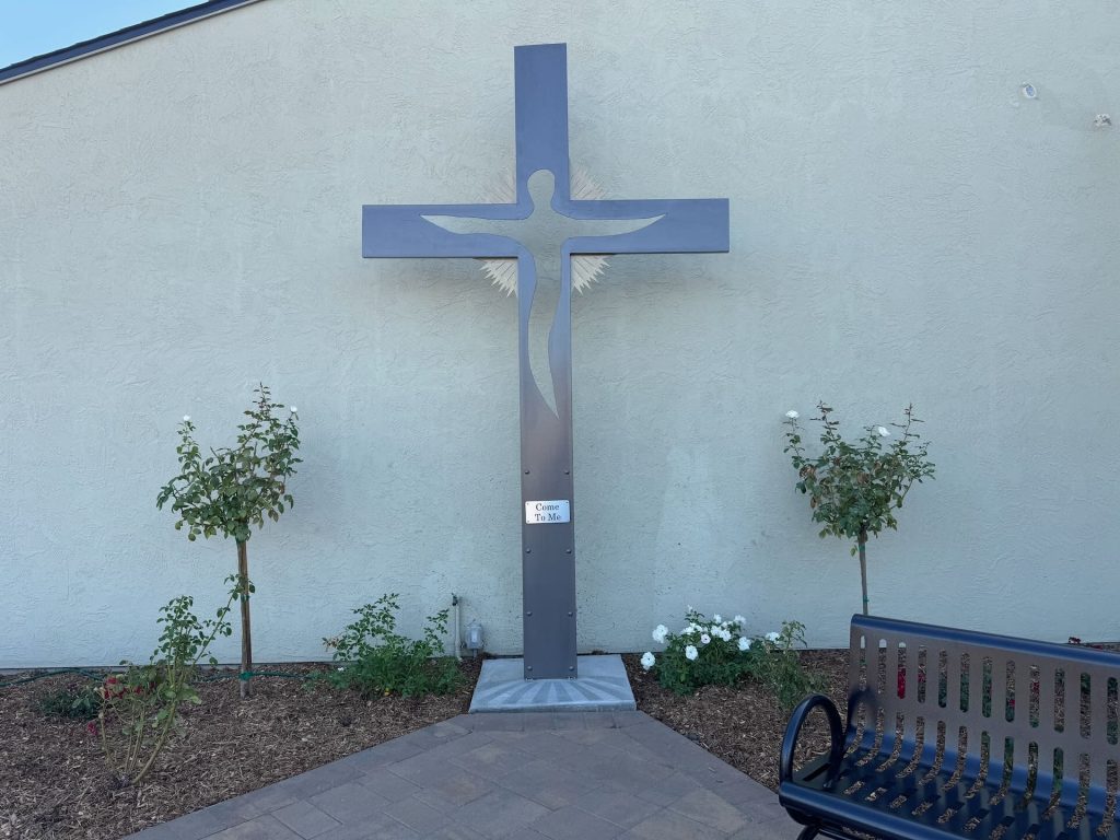 Cross with “Come to Me” message near the prayer labyrinth at Santa Teresa Church in San Jose